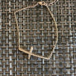 Small rhinestone cross bracelet!
